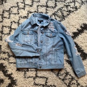 Ripped jean jacket